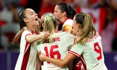 Canada celebrate what proved to be the winning goal against Colombia