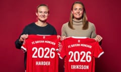 Pernille Harder and Magda Eriksson hold Bayern Munich shirts after signing for the club