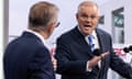 Scott Morrison gestures with hand towards Anthony Albanese during a leader's debate