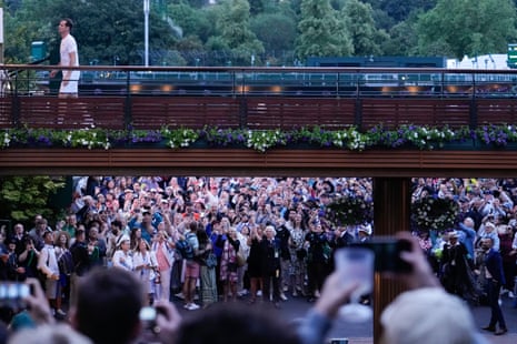 Fans cheer Andy Murray as he leaves Center Court.