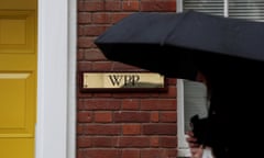 A logo hangs on the wall outside the WPP offices in London,