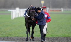 Kempton Races<br>SUNBURY, ENGLAND - DECEMBER 27: Barry Geraghty riding Sprinter Sacre returns after pulling up in The williamhill.com Desert Orchid Steeple Chase at Kempton Park racecourse on December 27, 2013 in Sunbury, England. (Photo by Alan Crowhurst/Getty Images)