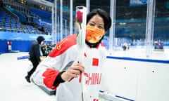 China’s only female ice hockey player You Jing receives a rose on International Women’s Day.