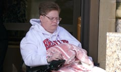 Tracy Menhinick pictured last month using a wheelchair while leaving the high court in Glasgow