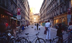 A Paris street scene in front of a cafe in Marais.