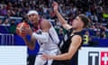 USA forward Paolo Banchero, left, became the youngest American to play at a World Cup in 17 years in Saturday’s win over New Zealand, scoring a game-high 21 points.