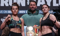 Chantelle Cameron (left) and Katie Taylor either side of promoter Eddie Hearn at the weigh-in before their super-lightweight world title rematch in Dublin.