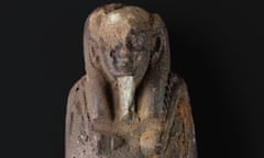 The upper half of a faience shabti inscribed for a man named Hor-sa-Iset, discovered in the school grounds.