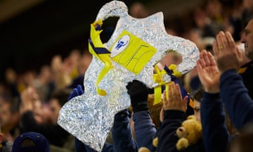 Oxford fan Alistair Short clutching his own replica FA Cup at full-time.