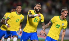 Gabriel Barbosa (centre) celebrates his penalty with Raphinha (No 17) and Antony (No 20).