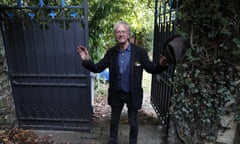 Austrian author Peter Handke gestures as he arrives back at his house in Chaville near Paris, Thursday, Oct. 10, 2019. Handke was awarded the 2019 Nobel Prize in literature earlier Thursday. (AP Photo/Francois Mori)