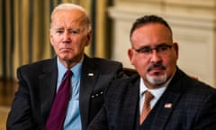 Joe Biden and the education secretary, Miguel Cardona