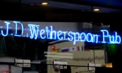 A blue neon JD Wetherspoon sign