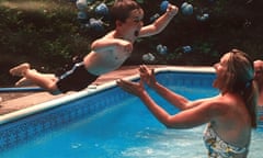 Jesse jumps into mother's arms in swimming pool