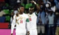 Senegal's forward Sadio Mane (R) celebrates with Senegal's forward Keita after scoring a goal during the 2017 Africa Cup of Nations group B football match between Senegal and Zimbabwe in Franceville on January 19, 2017. / AFP PHOTO / KHALED DESOUKIKHALED DESOUKI/AFP/Getty Images