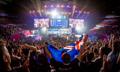 Stadium filled with fans watching competitive videogaming
