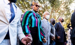 The Rev Al Sharpton arrives with Ahmaud Arbery's parents, Wanda Cooper-Jones, left, and Marcus Arbery, right, at the Glynn county courthouse.