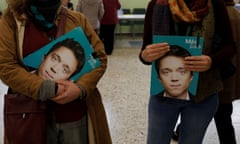 General election in Spain<br>Two persons hold folders depicting Mas Pais (More Country) leader Iñigo Errejon, during general election in Madrid, Spain, November 10, 2019. REUTERS/Jon Nazca