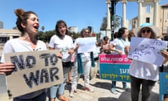Arab and Jewish Israeli women protest at Jaffa, near Tel Aviv, against violence between Israel and Hamas, 14 May 2021.