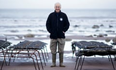 Roger Hall from Porlock Futures with oyster trestles in Porlock Bay