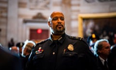 Bald man with beard wearing uniform