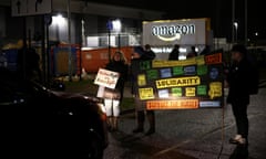 workers hold banners