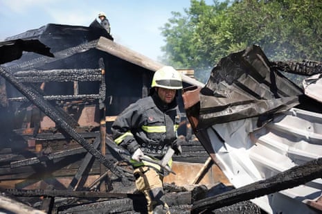 In this photo released by the Dnipro Regional Administration, rescuers work at the scene of a building damaged during Russia's missile attack in Dnipro, Ukraine, on Wednesday.