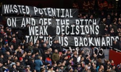 Crystal Palace fans display a banner highlighting their dissatisfaction with the direction of the club.