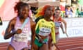 Britain's Dina Asher-Smith and Jamaica's Shelly-Ann Fraser-Pryce in the 4x100m relay final  at the world championships