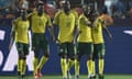 South Africa’s players congratulate Thembinkosi Lorch (right) after he opened the scoring in the dying minutes. 