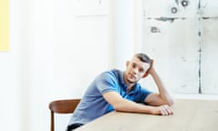 Portrait of Russell Tovey in a blue shirt