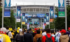 Fans walk down Wembley Way before the Champions League final match between Borussia Dortmund and Real Madrid at Wembley Stadium