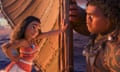 This image released by Disney shows characters Maui, voiced by Dwayne Johnson, right, and Moana, voiced by Auli’i Cravalho, in a scene from the animated film, “Moana.” (Disney via AP)