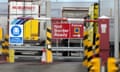 Customs signs directing lorry drivers to the correct lanes for administration checks at Holyhead port in Wales.