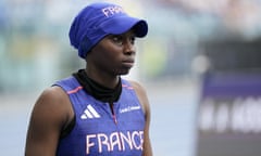 Sounkamba Sylla in French athletics team kit with a blue baseball cap/hijab