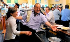 Sisto Malaspina enjoying a lighter moment with his staff in Pellegrini’s Espresso Bar in Melbourne.