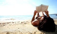 Woman reading on the beach