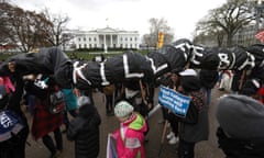 FILE PHOTO: Indigenous leaders participate in protest march and rally outside White House in Washington<br>FILE PHOTO: Indigenous leaders participate in a protest march and rally in opposition to the Dakota Access and Keystone XL pipelines in front of the White House in Washington, U.S., March 10, 2017. REUTERS/Kevin Lamarque/File Photo