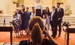 Professional photographer shooting a wedding inside a church