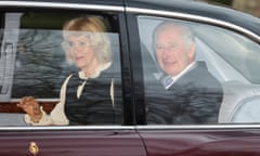 Queen Camilla and King Charles in the back of their car
