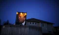A picture of Donald Trump hangs outside a house in West Des Moines, Iowa, in January 2016.