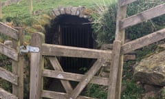 The gate to the disused mine where two men were rescued unharmed after they became trapped half a mile underground.