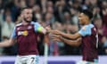 Aston Villa captain John McGinn (left) celebrates with Aston Villa's Ollie Watkins after scoring the second goal against Lille.