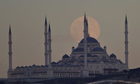 First supermoon of 2021 rises across the globe – video