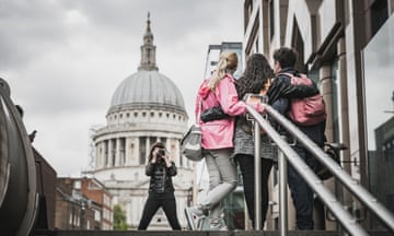 The modern way of looking at things!<br>Tourist photograph themselves whilst sight seeing in London