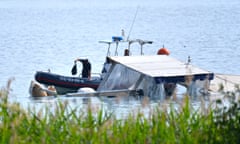 Three intelligence officers died after a tourist boat sank on Lake Maggiore on Sunday during bad weather.