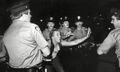 A protester faces up to police officers at the Stonewall Inn in New York in June 1969