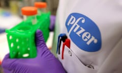 Pfizer logo on lab coat