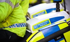 An officer from the Metropolitan police on a motorcycle