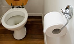Toilet bowl and paper